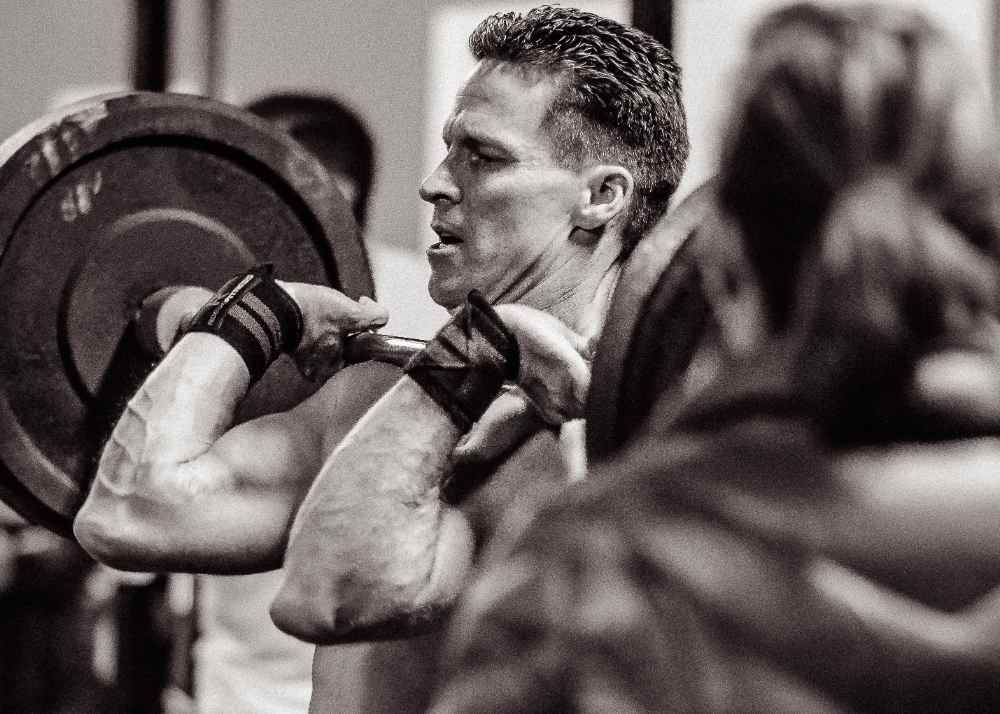 Olympic Barbell vs Powerlifting Barbells – What’s the Difference