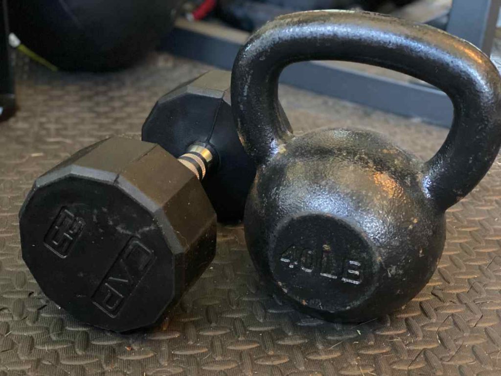 Kettlebells vs Dumbbells: Pros, Cons, and Differences