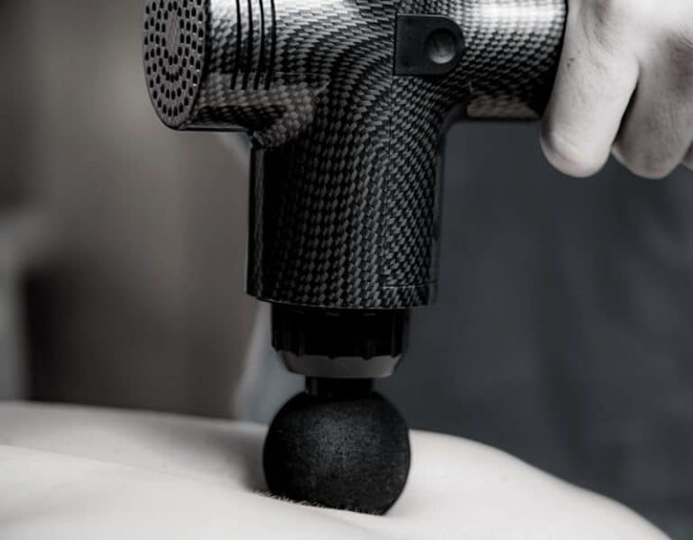 8 Benefits of Massage Guns (and How Often to Use Them)